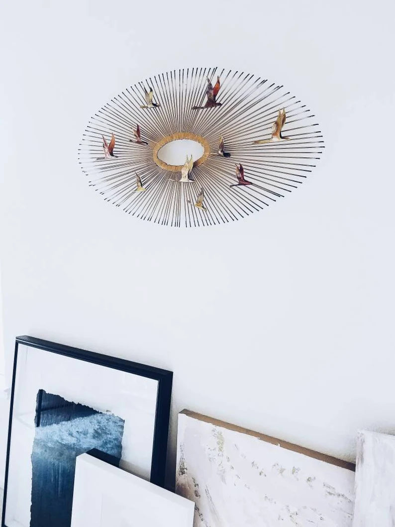 MID-CENTURY MODERN WALL SCULPTURE "BIRDS IN FLIGHT ON SUNBURST"